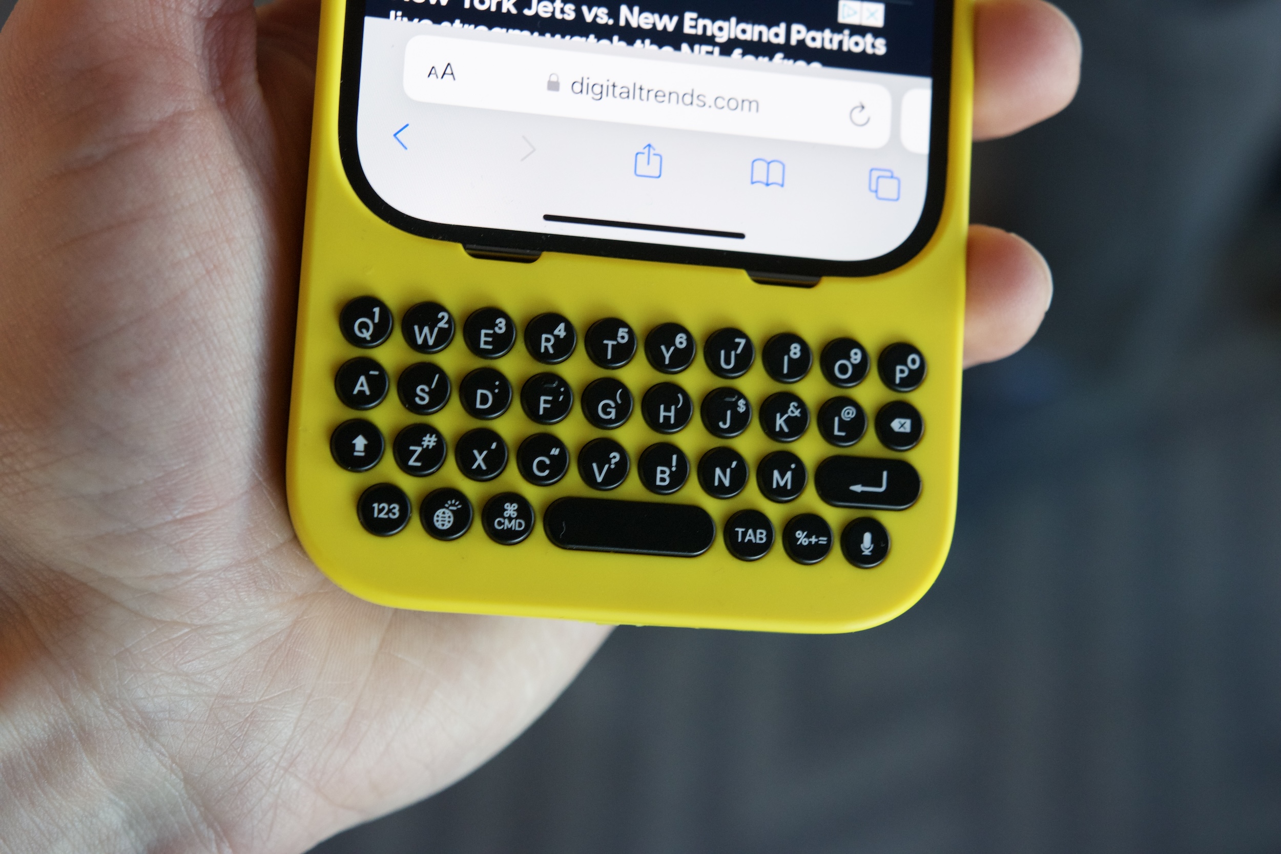 The keyboard on a yellow Clicks keyboard case.