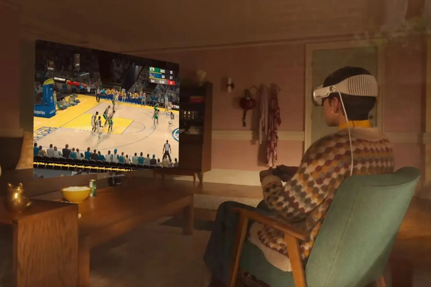 一个人用苹果Vision Pro头戴式显示器和游戏手柄玩篮球游戏。