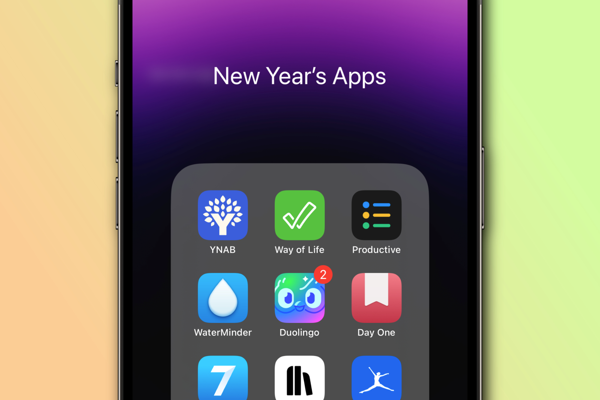 Una carpeta de aplicaciones en un iPhone titulada 'Aplicaciones de Año Nuevo'.