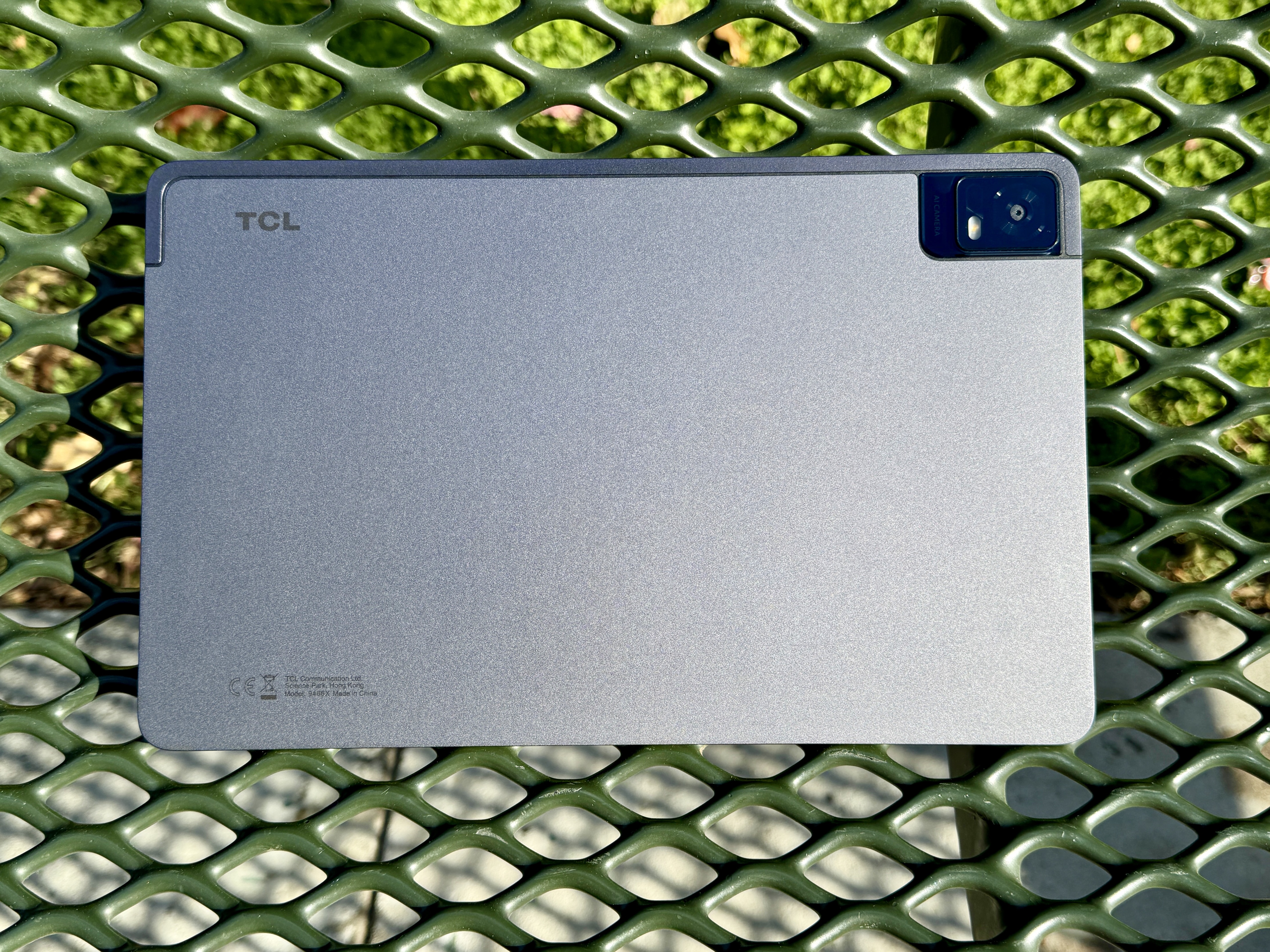 TCL NxtPaper 11 on bench showing back
