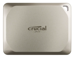 Золотисто-бежевый портативный SSD с логотипом “Crucial” на передней стороне