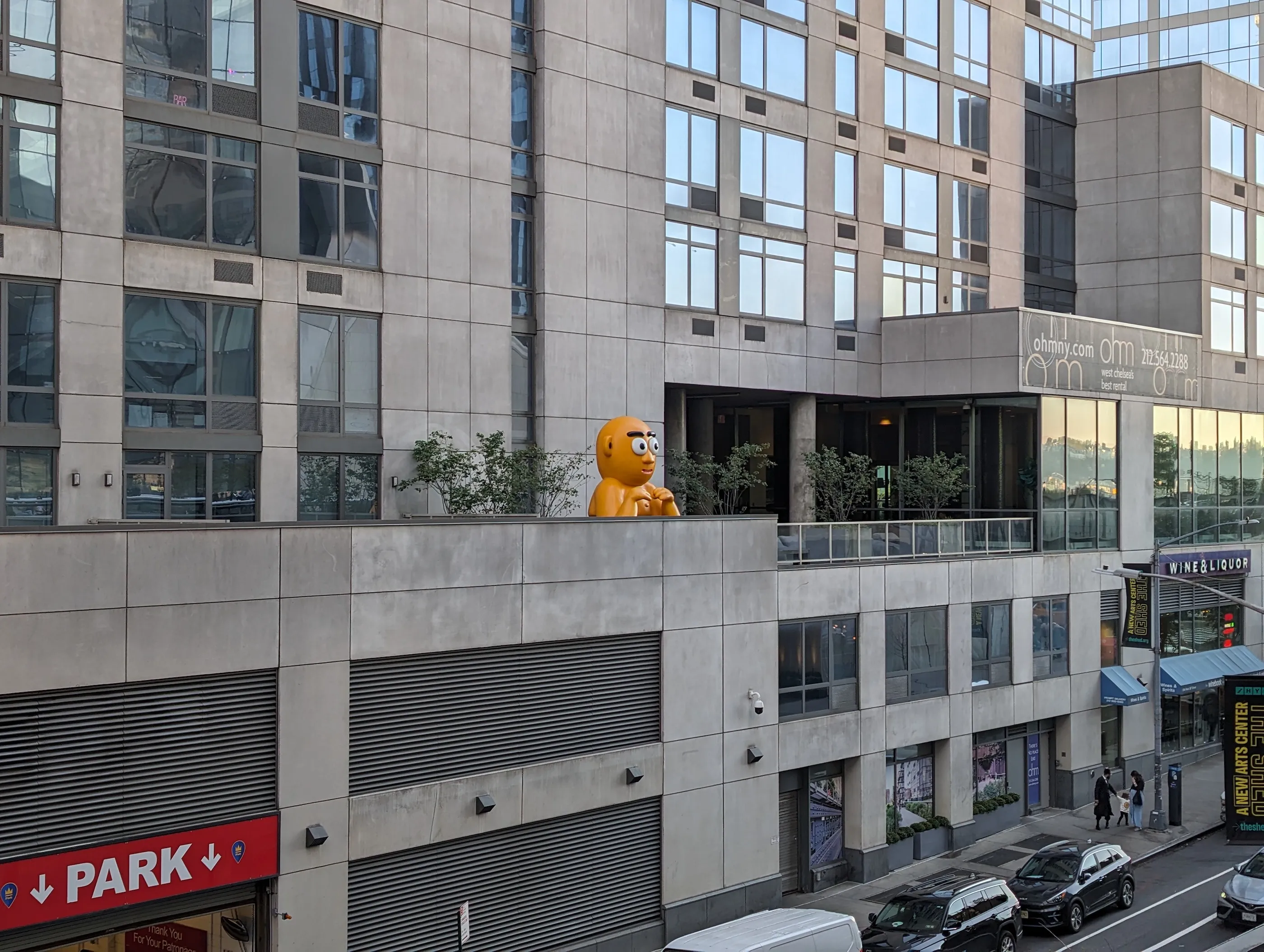 Photo of a yellow statue on a building in NYC, taken with the Google Pixel 8 Pro.